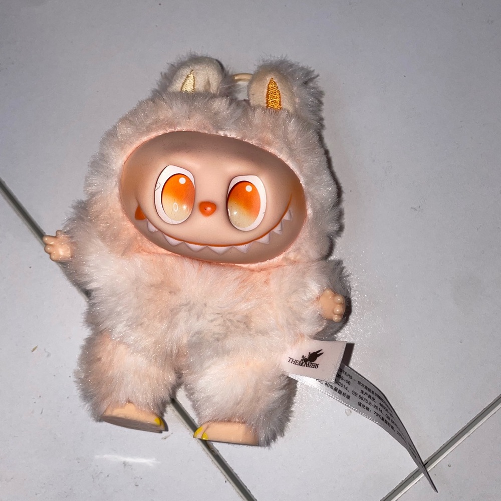 Big into energy labubu/lafufu orange happiness